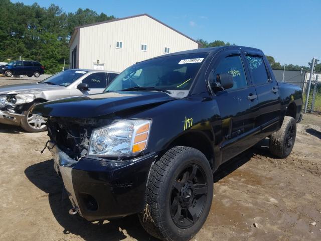 Photo 1 VIN: 1N6BA0EC8AN320595 - NISSAN TITAN XE 