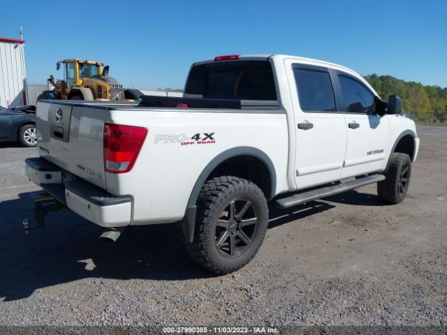 Photo 3 VIN: 1N6BA0EC9AN305412 - NISSAN TITAN 