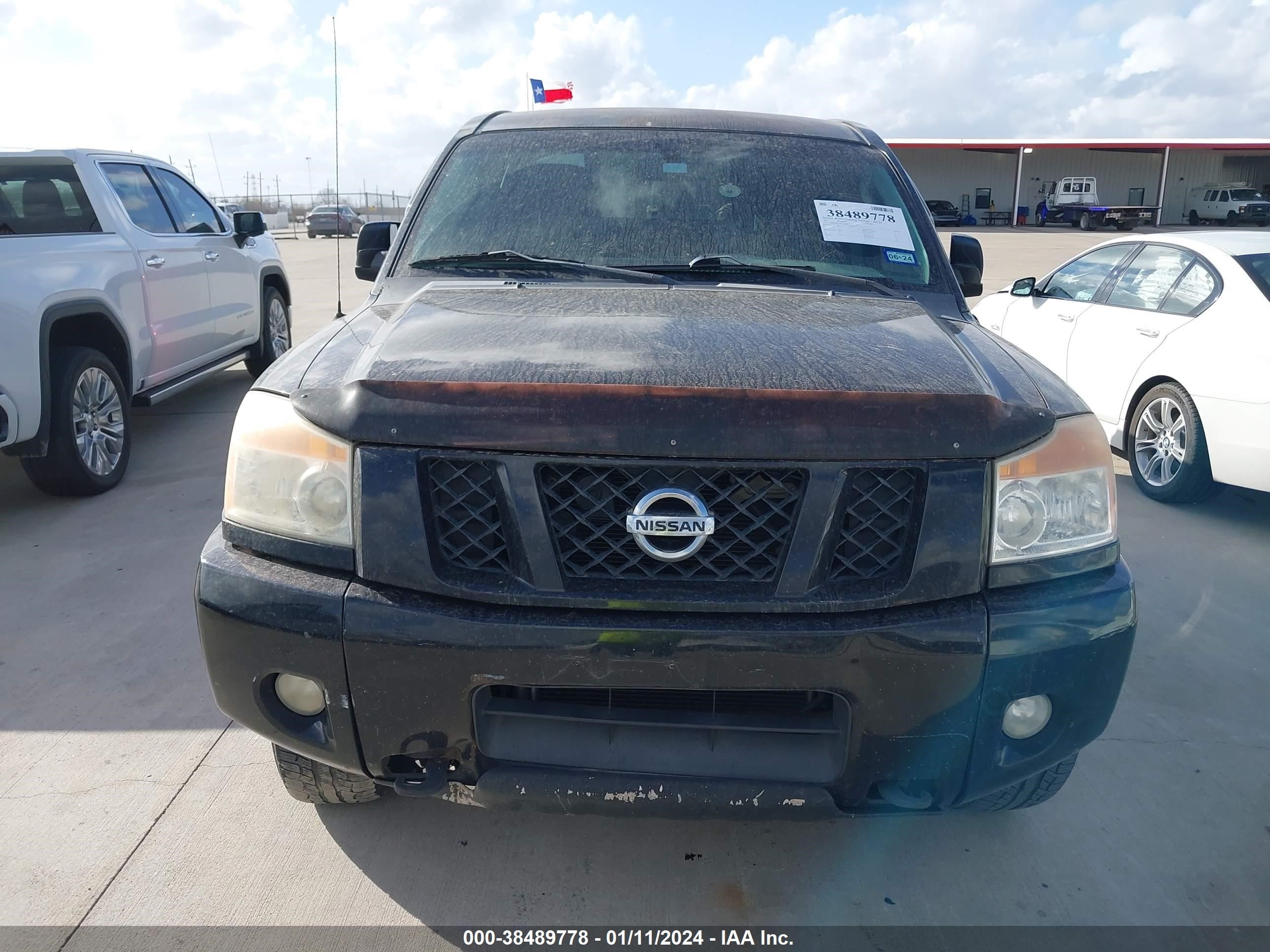 Photo 10 VIN: 1N6BA0ECXBN304965 - NISSAN TITAN 