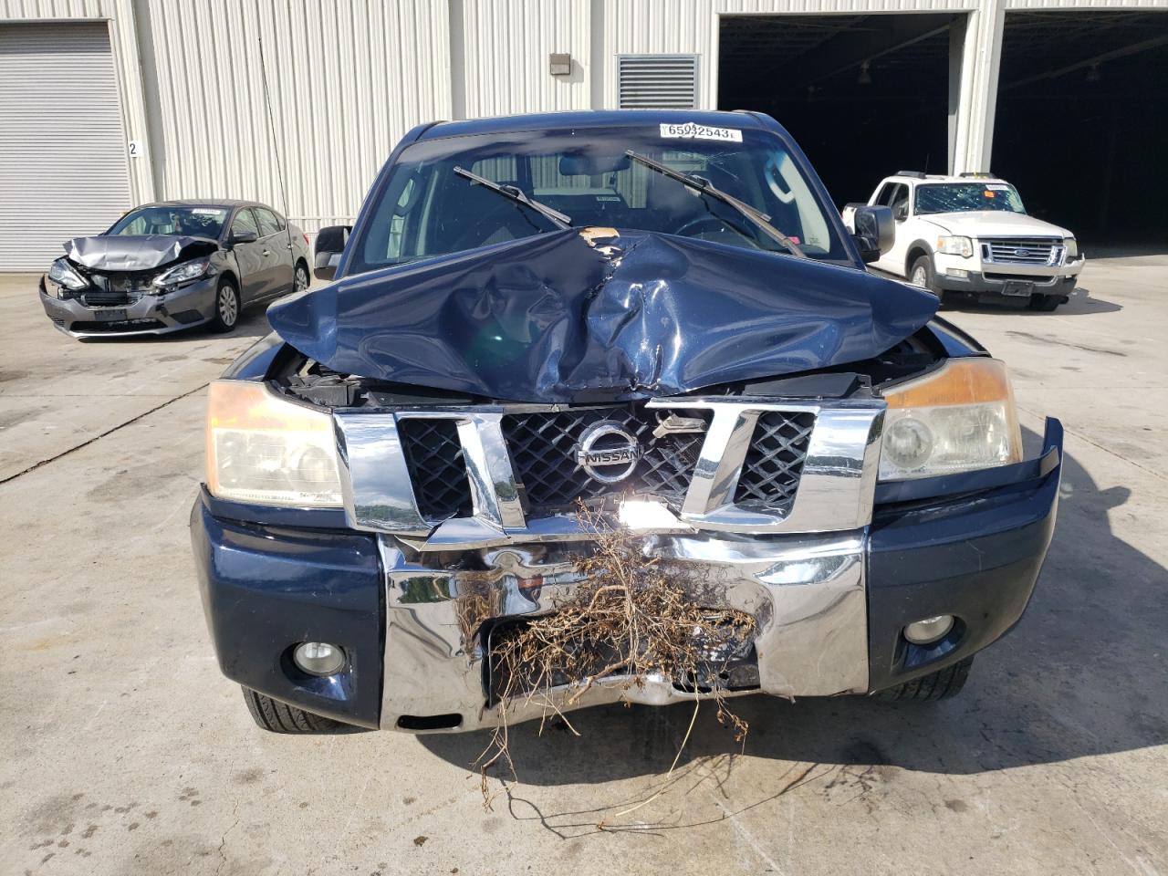 Photo 4 VIN: 1N6BA0ED3AN311621 - NISSAN TITAN 