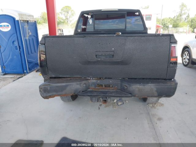 Photo 5 VIN: 1N6BA0ED4BN312973 - NISSAN TITAN 