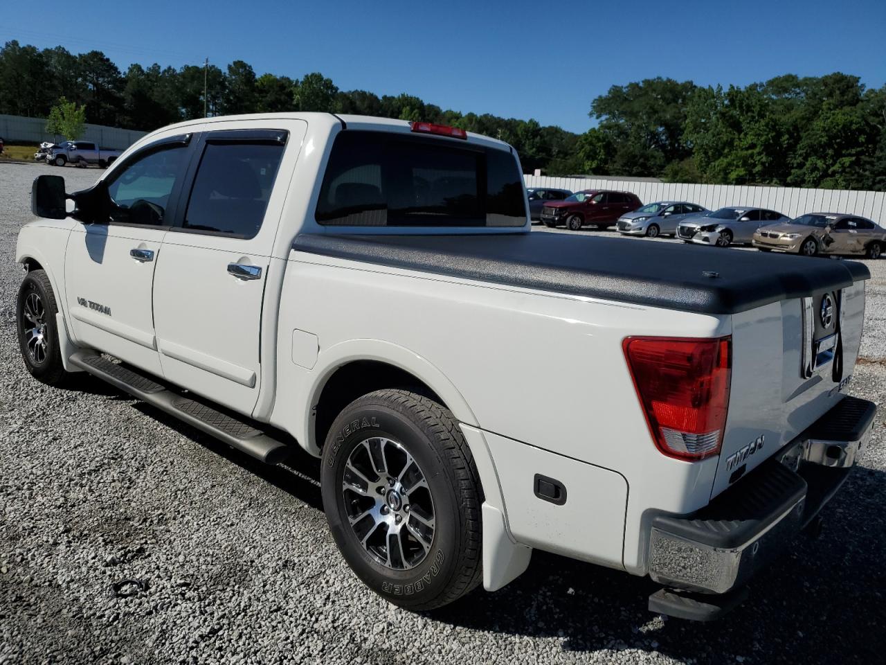 Photo 1 VIN: 1N6BA0ED9AN312594 - NISSAN TITAN 