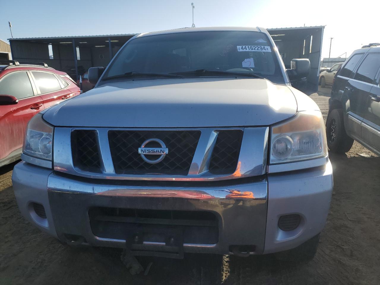 Photo 4 VIN: 1N6BA0EJ5AN322254 - NISSAN TITAN 