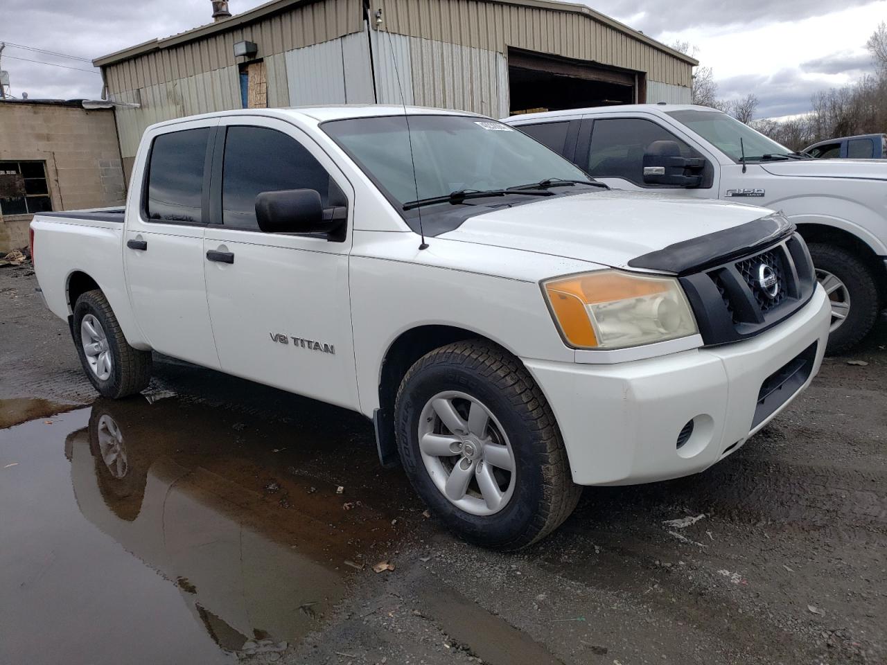 Photo 3 VIN: 1N6BA0EK0AN304799 - NISSAN TITAN 