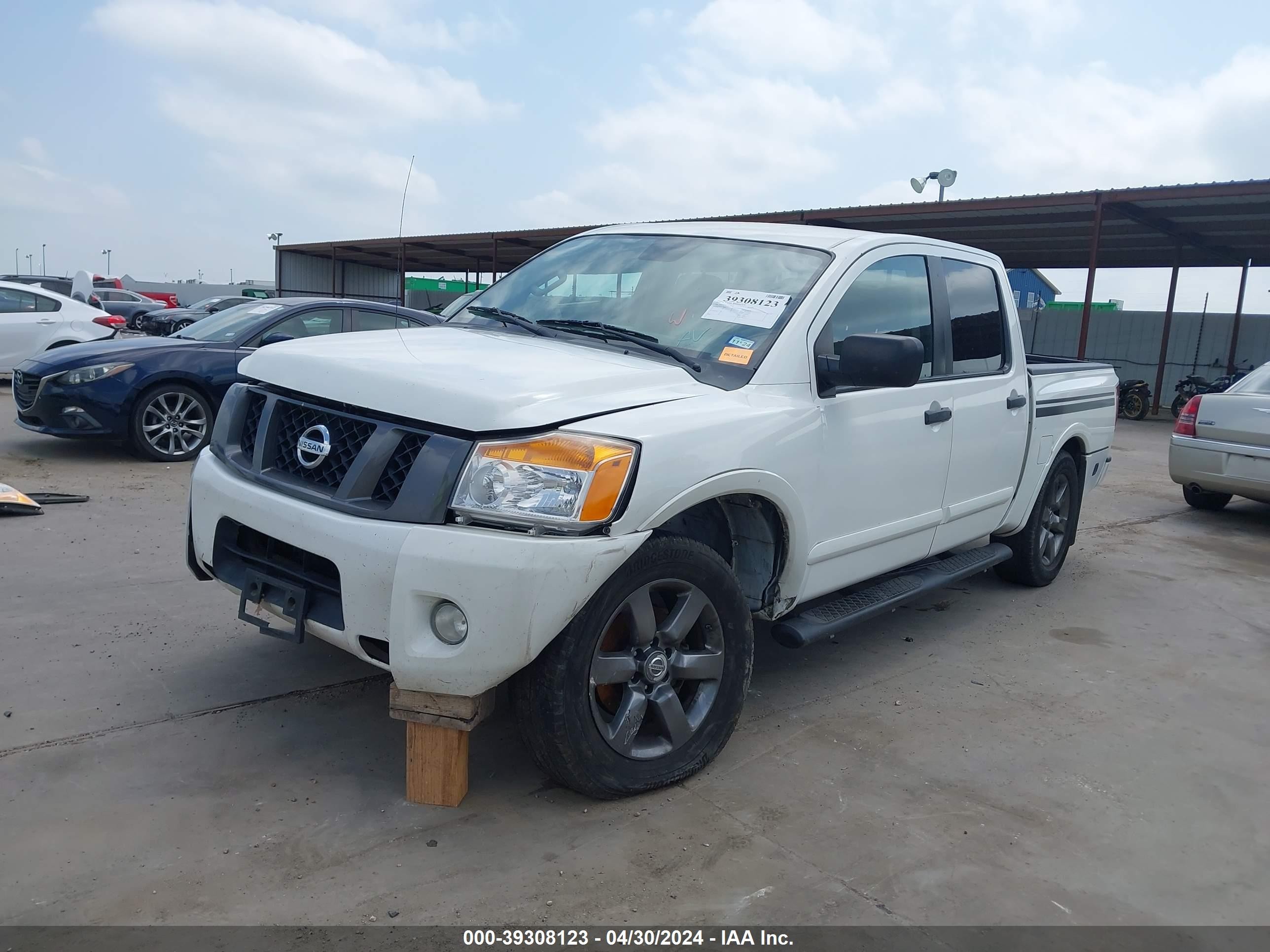 Photo 1 VIN: 1N6BA0EK7CN310179 - NISSAN TITAN 