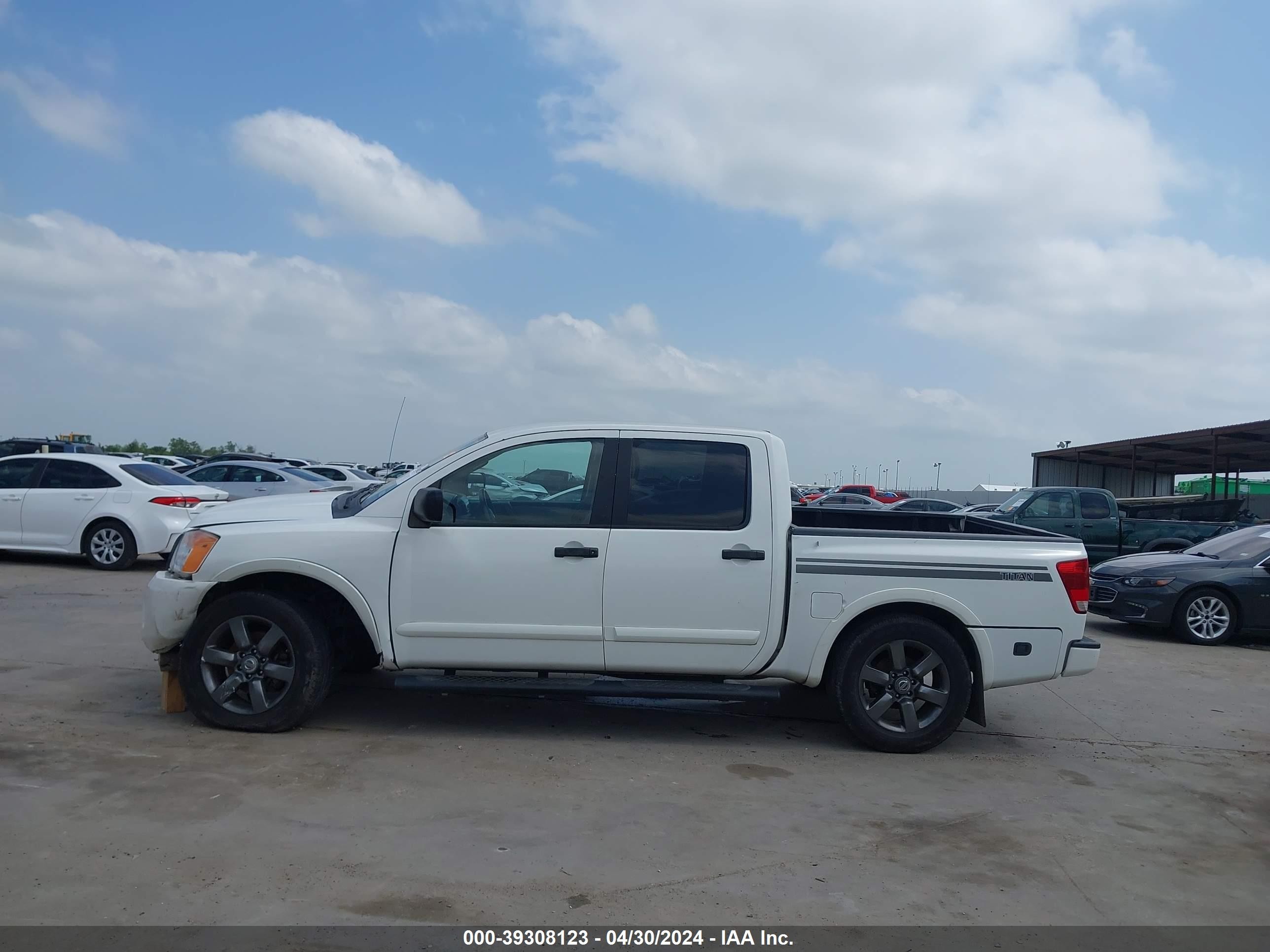 Photo 14 VIN: 1N6BA0EK7CN310179 - NISSAN TITAN 