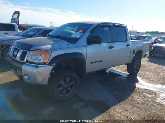 Photo 1 VIN: 1N6BA0EKXBN318467 - NISSAN TITAN 