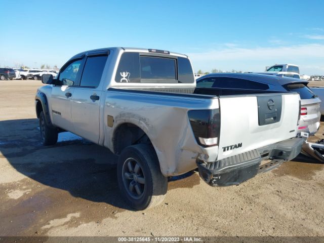 Photo 2 VIN: 1N6BA0EKXBN318467 - NISSAN TITAN 