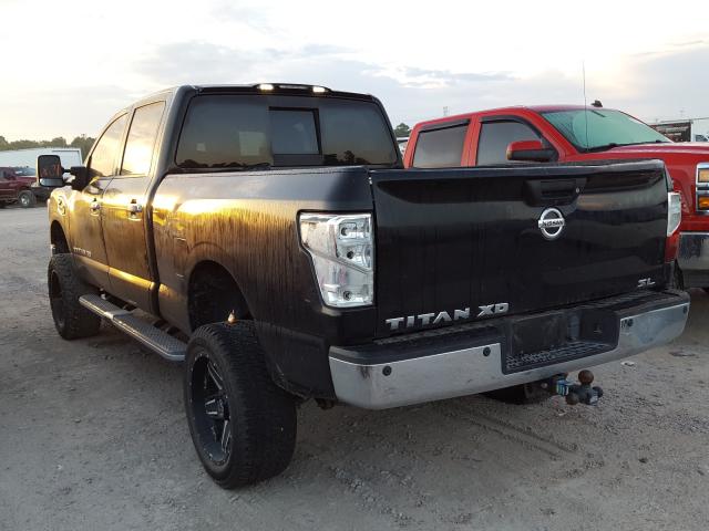 Photo 2 VIN: 1N6BA1F25GN505594 - NISSAN TITAN XD S 