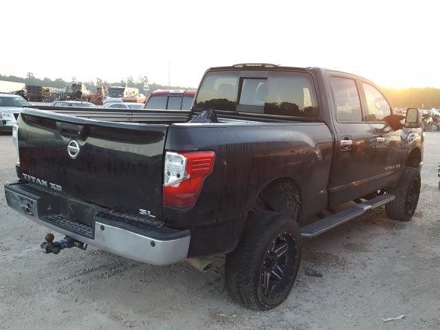 Photo 3 VIN: 1N6BA1F25GN505594 - NISSAN TITAN XD S 