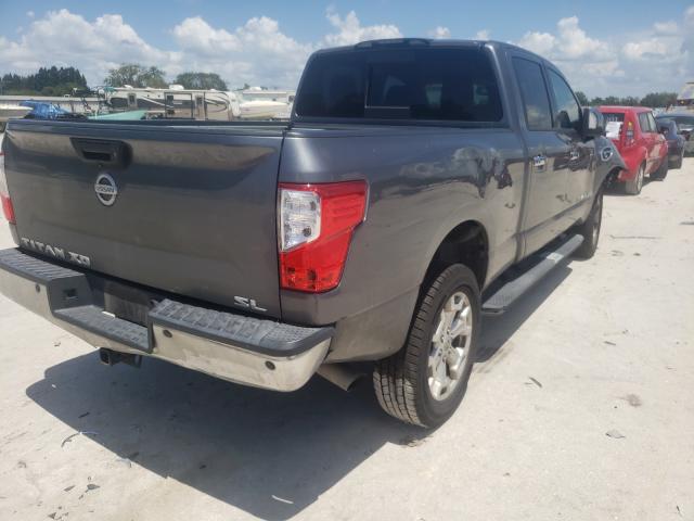 Photo 3 VIN: 1N6BA1F26GN504390 - NISSAN TITAN XD 