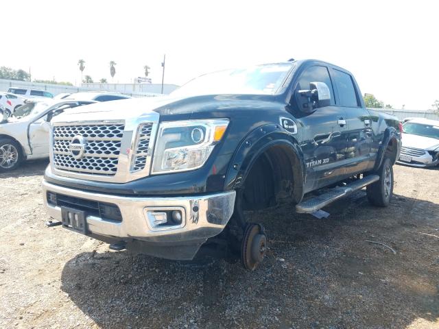 Photo 1 VIN: 1N6BA1F42GN505022 - NISSAN TITAN XD 