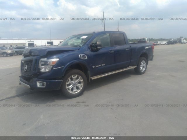 Photo 1 VIN: 1N6BA1F42KN521939 - NISSAN TITAN XD 