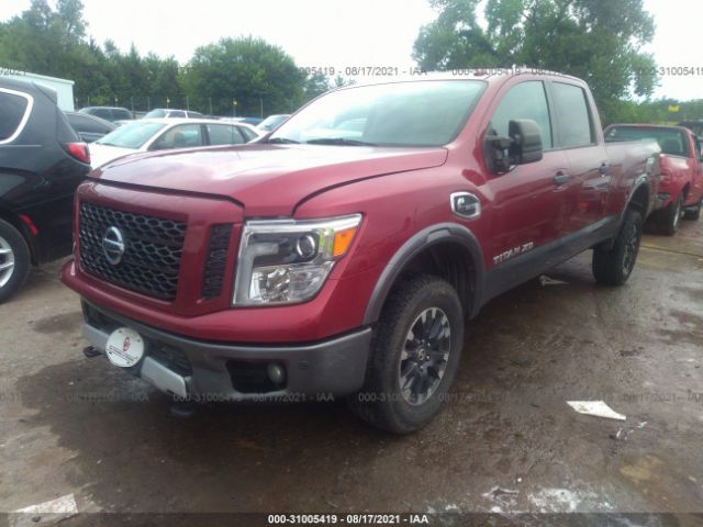 Photo 1 VIN: 1N6BA1F48GN506207 - NISSAN TITAN XD 