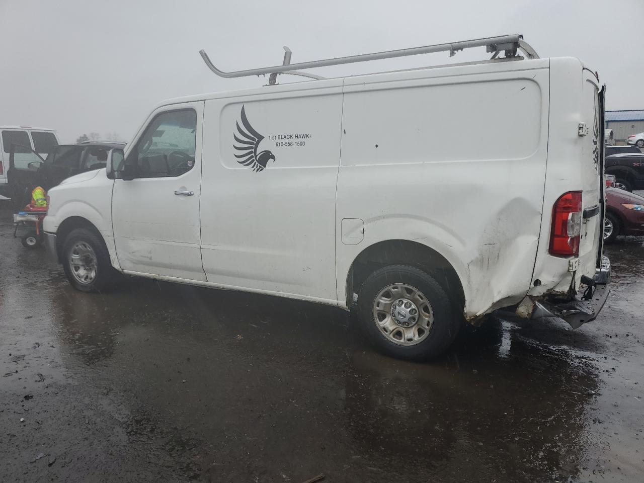 Photo 1 VIN: 1N6BF0KL2CN116335 - NISSAN NV 