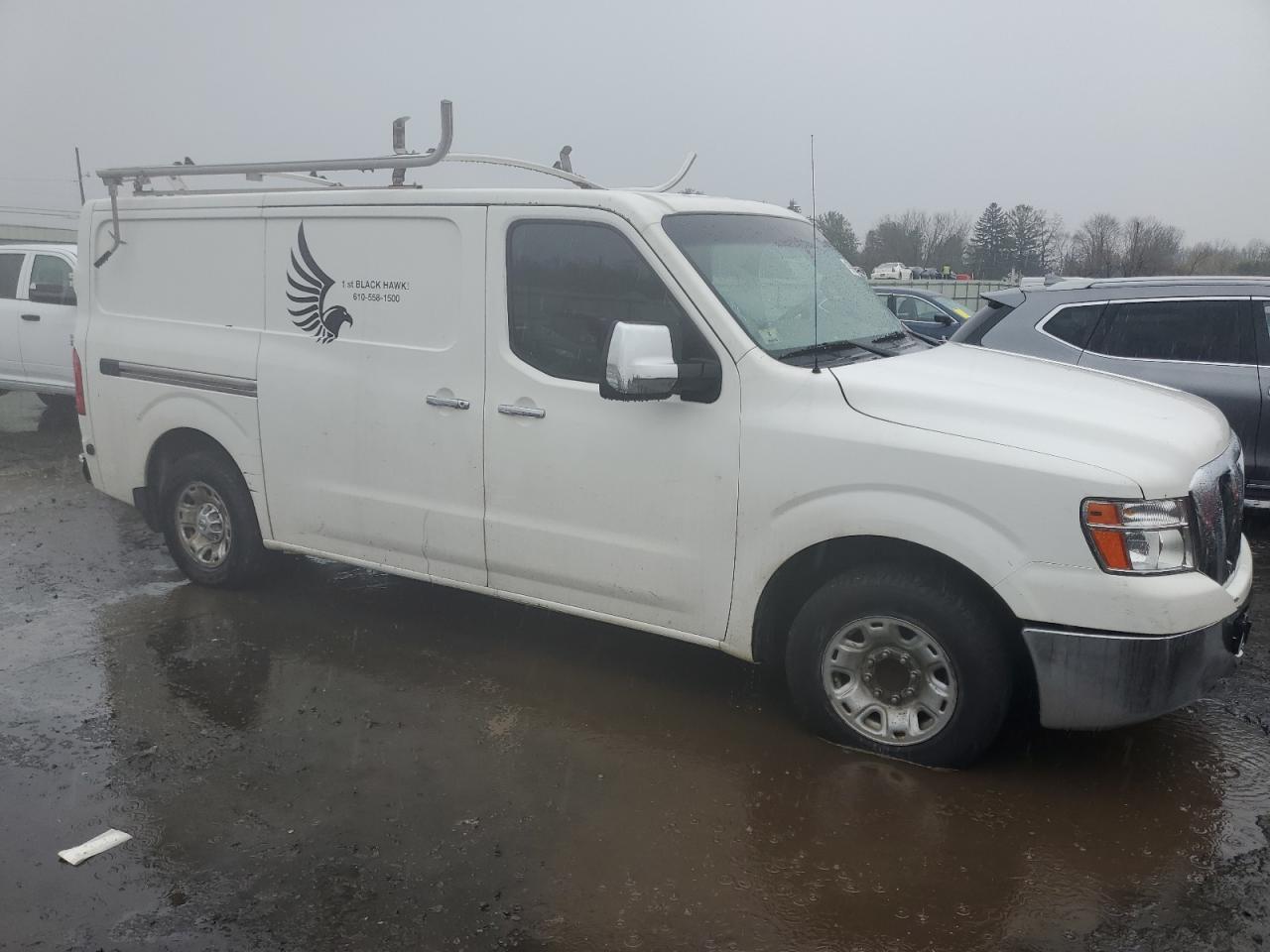 Photo 3 VIN: 1N6BF0KL2CN116335 - NISSAN NV 