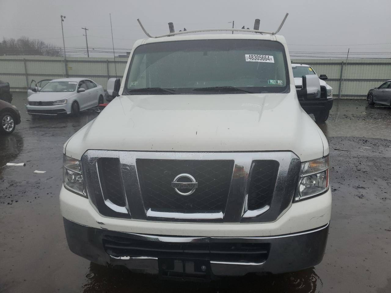 Photo 4 VIN: 1N6BF0KL2CN116335 - NISSAN NV 