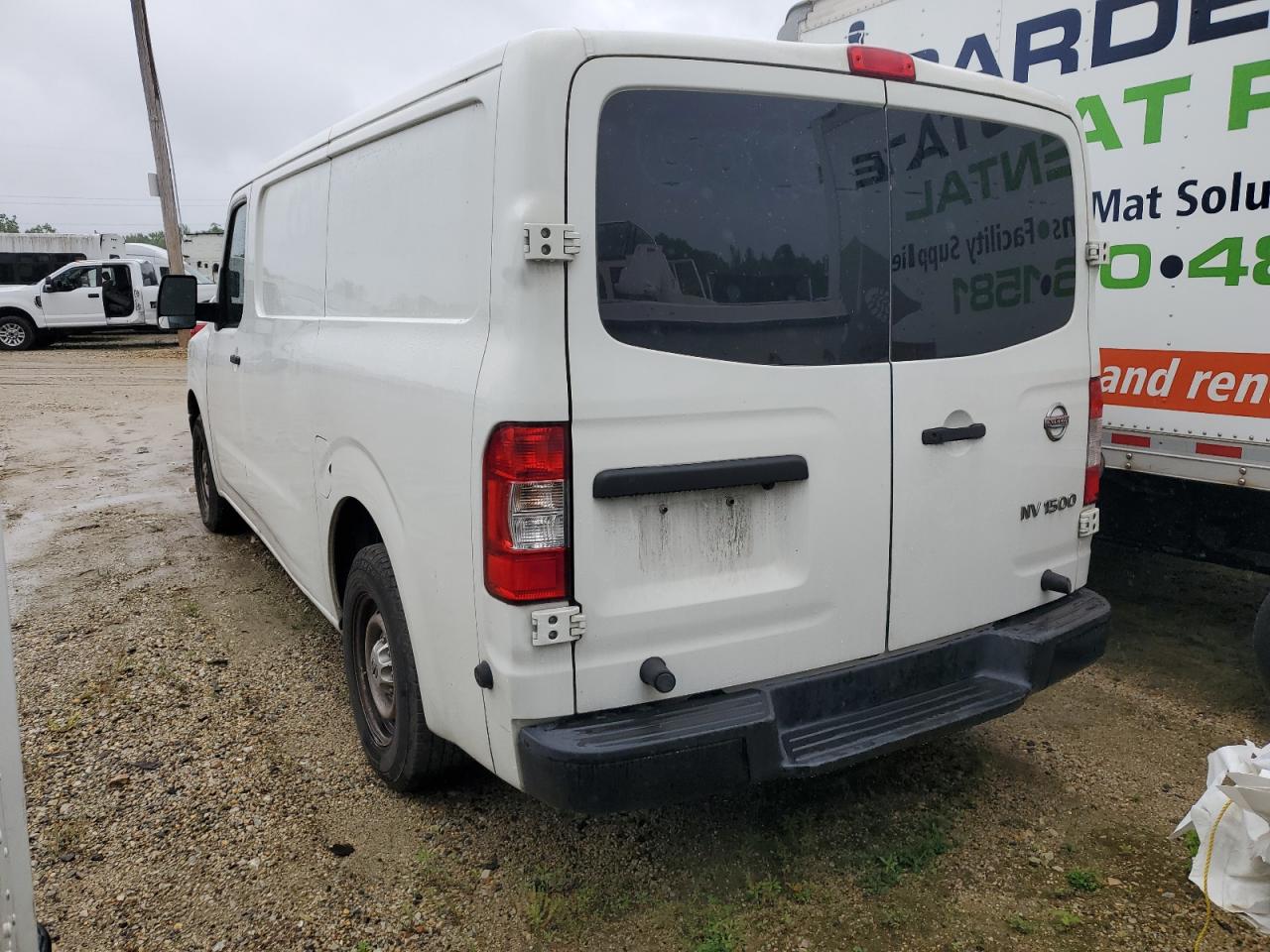 Photo 2 VIN: 1N6BF0KM1GN807368 - NISSAN NV 