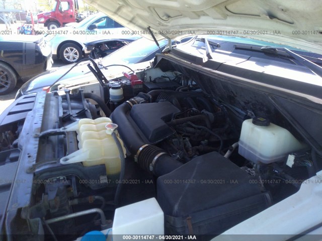 Photo 9 VIN: 1N6BF0KM7CN111608 - NISSAN NV 