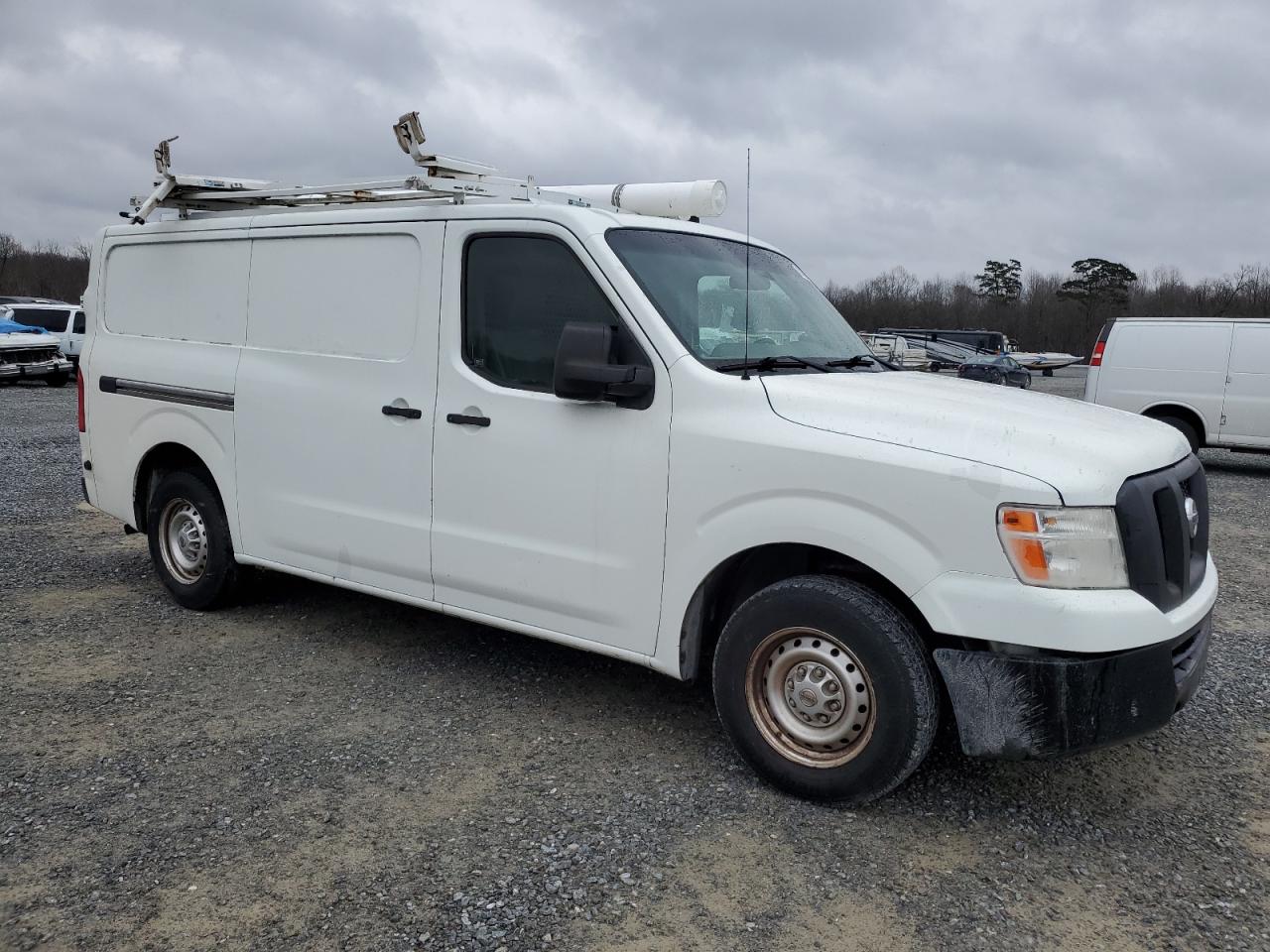 Photo 3 VIN: 1N6BF0KM9DN100367 - NISSAN NV 