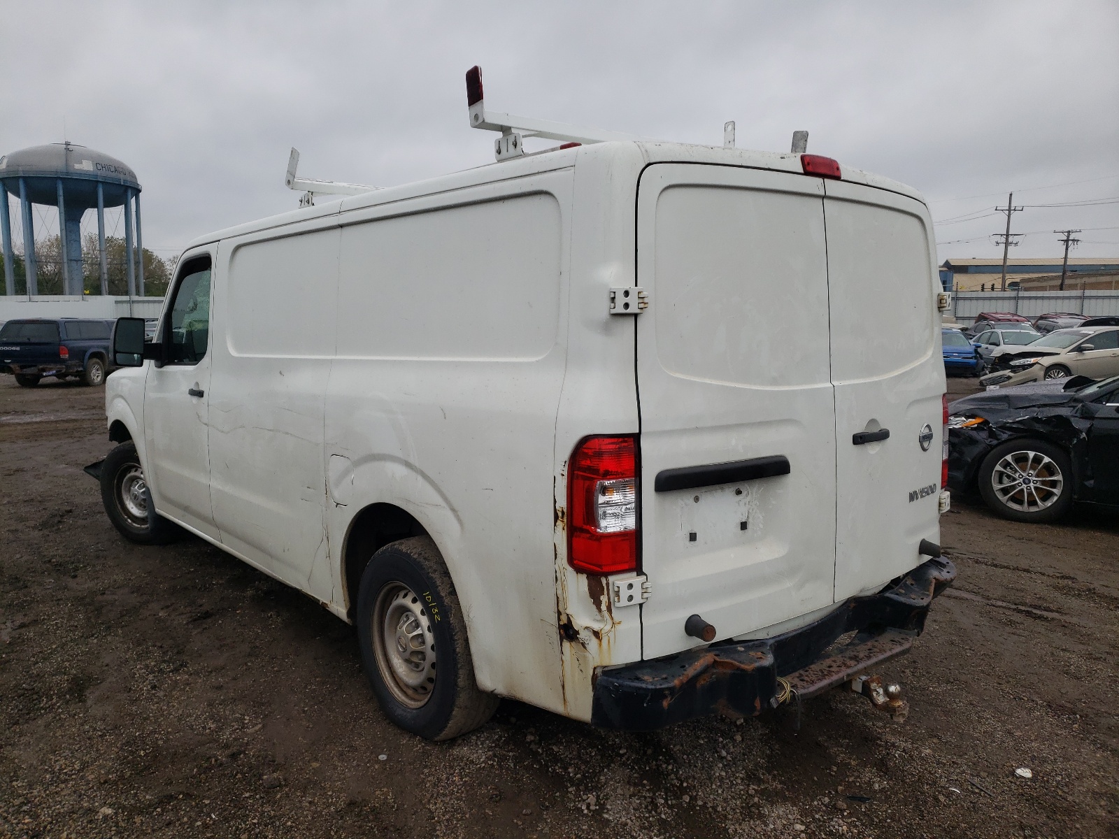 Photo 2 VIN: 1N6BF0KMXGN802587 - NISSAN NV 