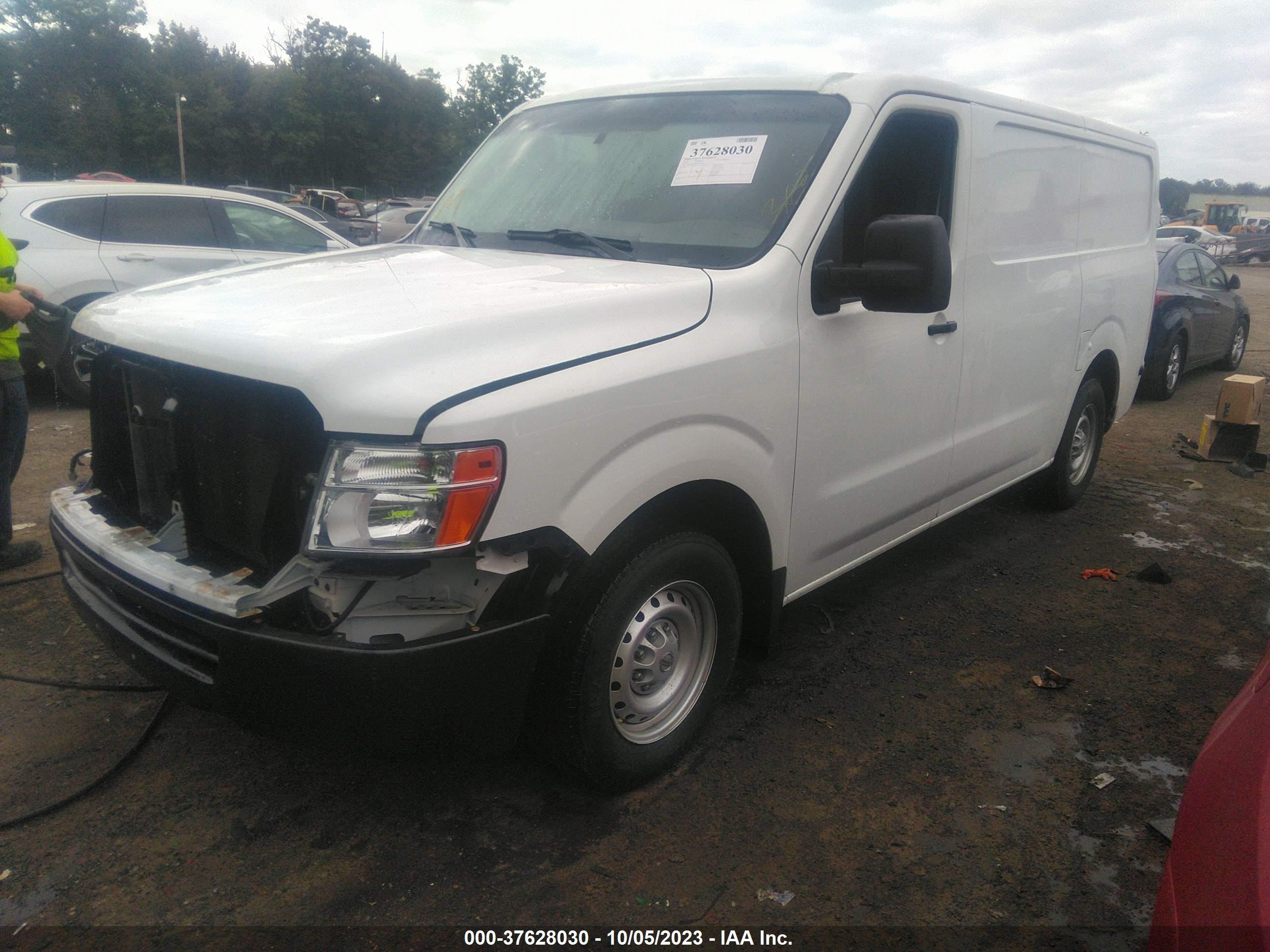 Photo 1 VIN: 1N6BF0KMXJN815136 - NISSAN NV 