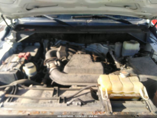 Photo 9 VIN: 1N6BF0KX1DN107680 - NISSAN NV 