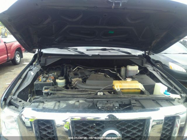 Photo 9 VIN: 1N6BF0KX7DN100796 - NISSAN NV 