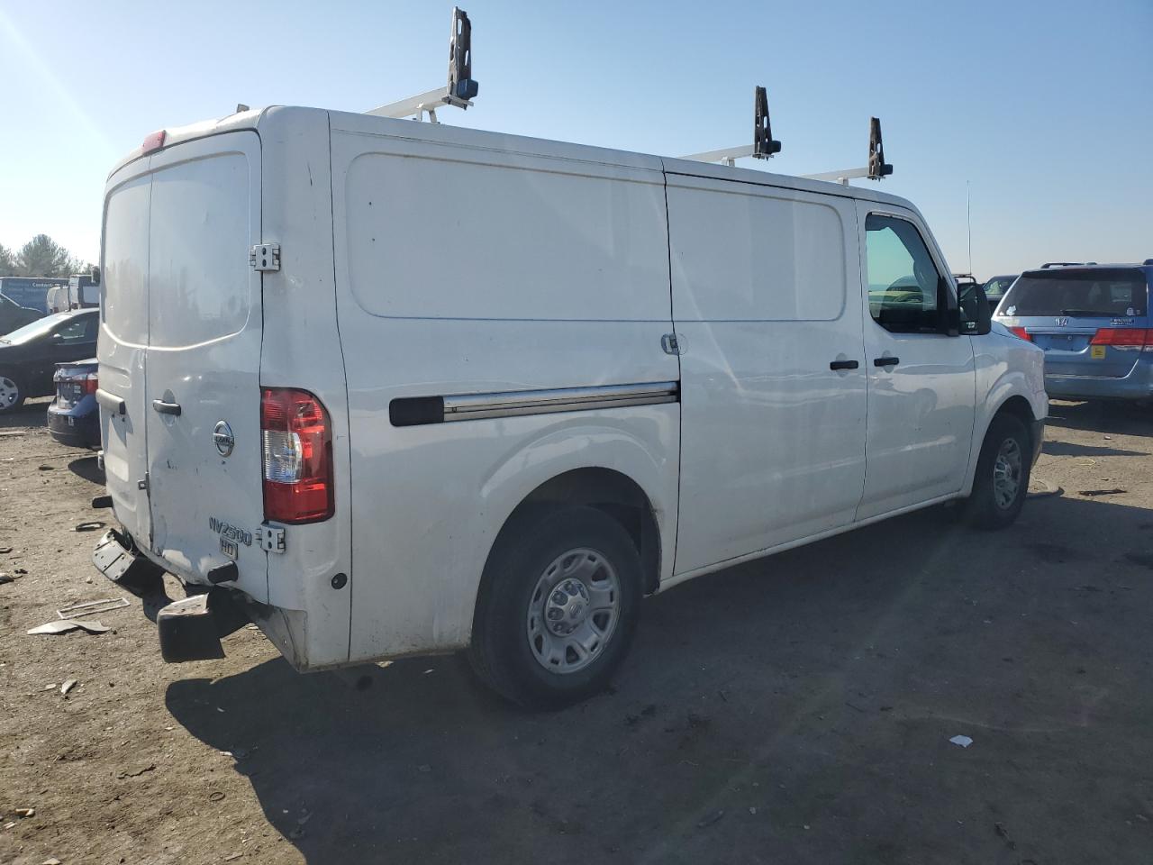 Photo 2 VIN: 1N6BF0KY5CN106197 - NISSAN NV 