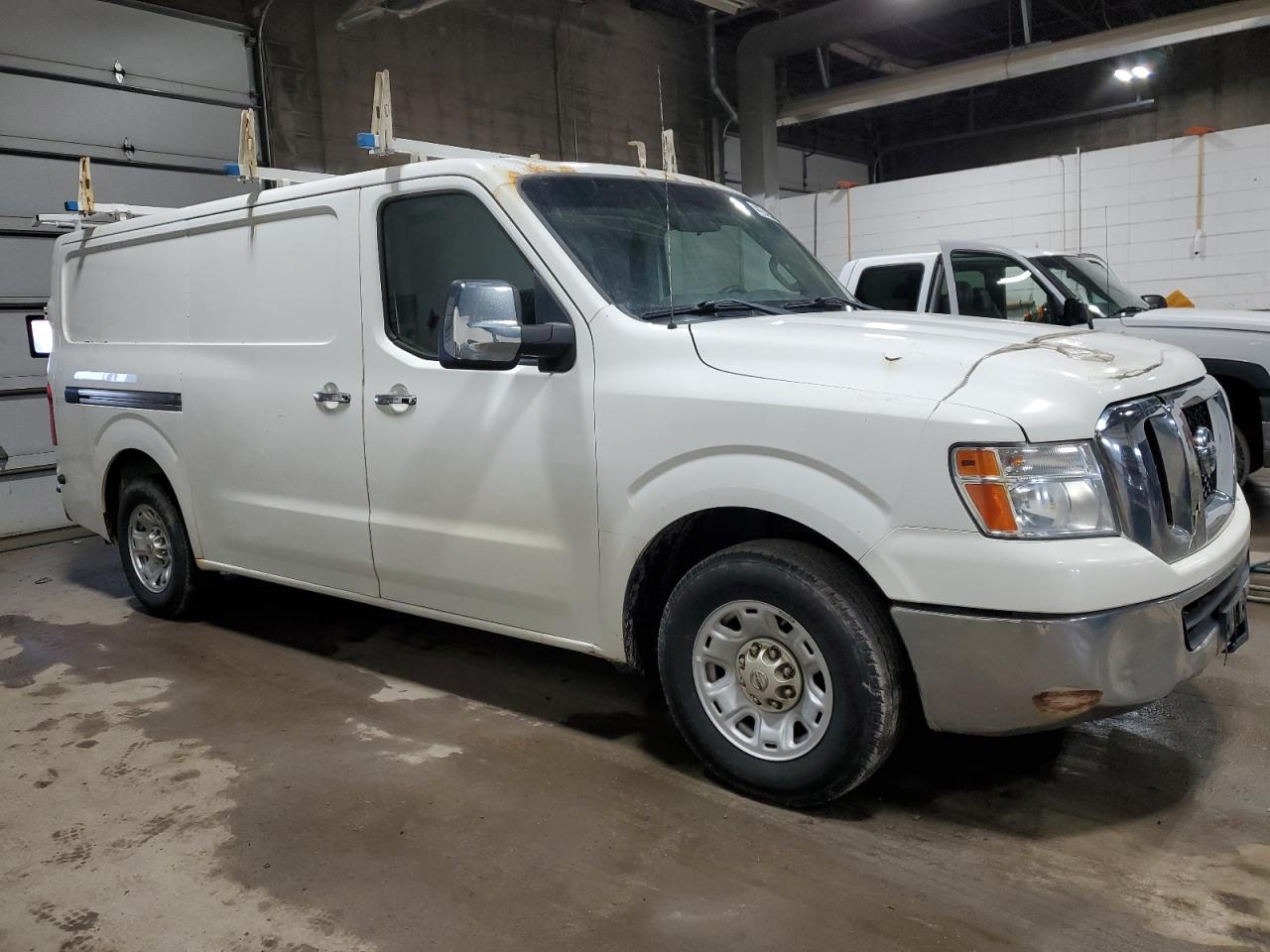 Photo 3 VIN: 1N6BF0KY7CN107528 - NISSAN NV 