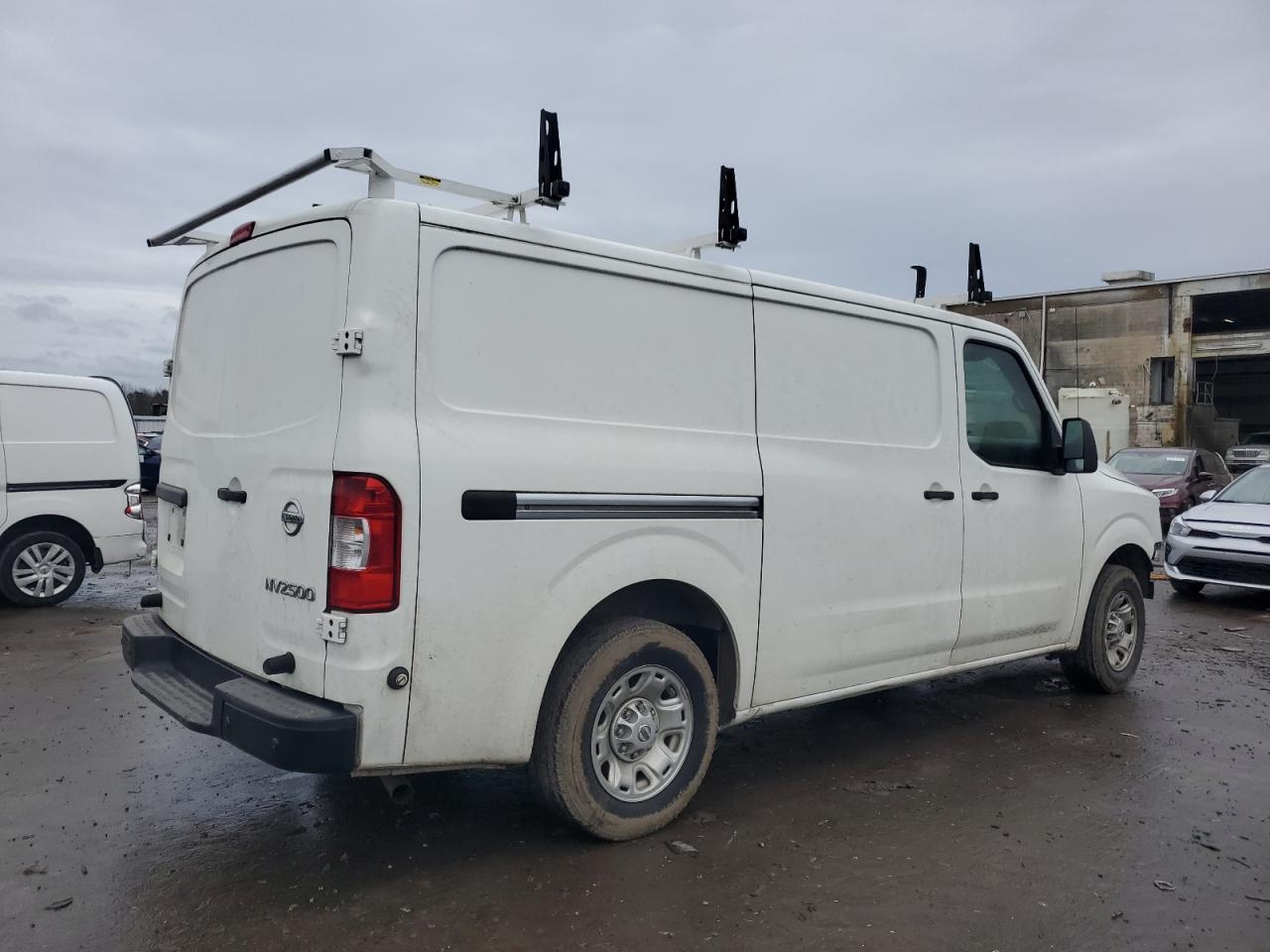 Photo 2 VIN: 1N6BF0KYXKN809616 - NISSAN NV 