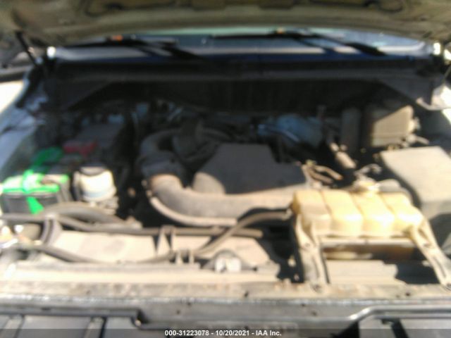 Photo 9 VIN: 1N6BF0LX2CN112495 - NISSAN NV 