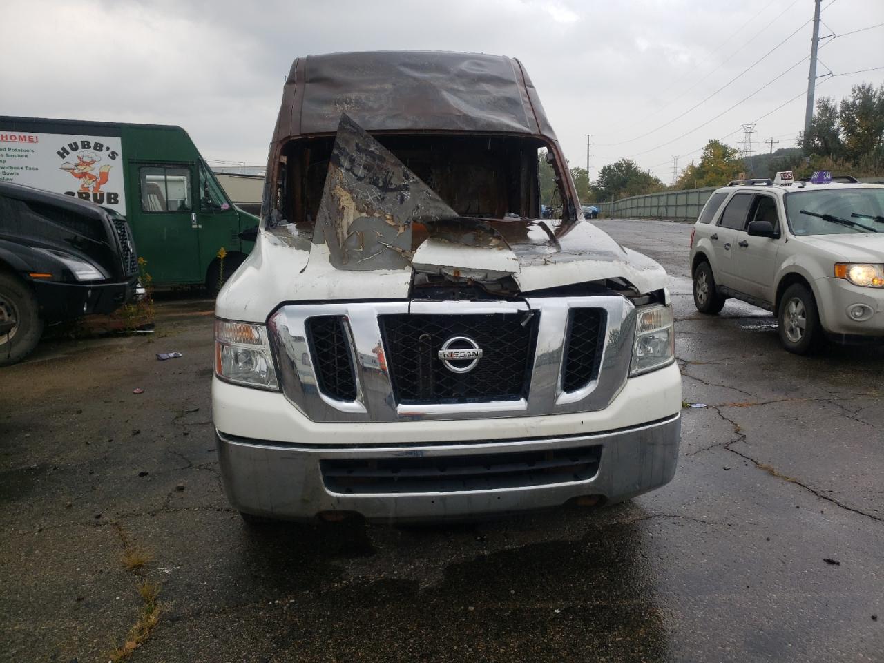 Photo 4 VIN: 1N6BF0LY0CN104646 - NISSAN NV 