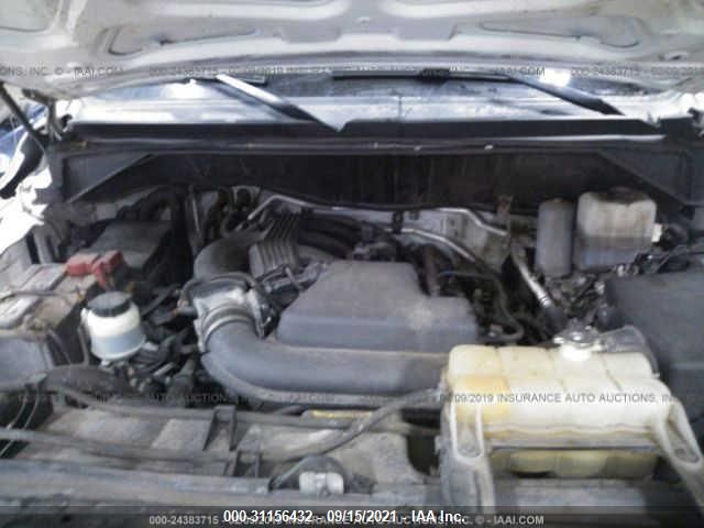 Photo 8 VIN: 1N6BF0LY9CN112776 - NISSAN NV 