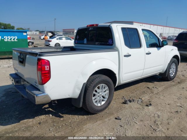 Photo 3 VIN: 1N6DD0ER1HN765811 - NISSAN FRONTIER 