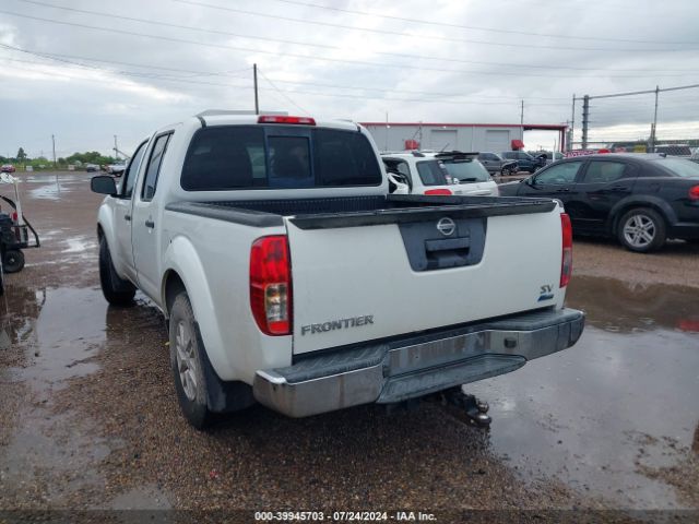 Photo 2 VIN: 1N6DD0ERXKN870063 - NISSAN FRONTIER 