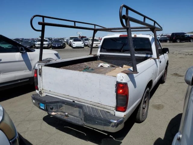 Photo 2 VIN: 1N6DD21S3YC300883 - NISSAN FRONTIER 