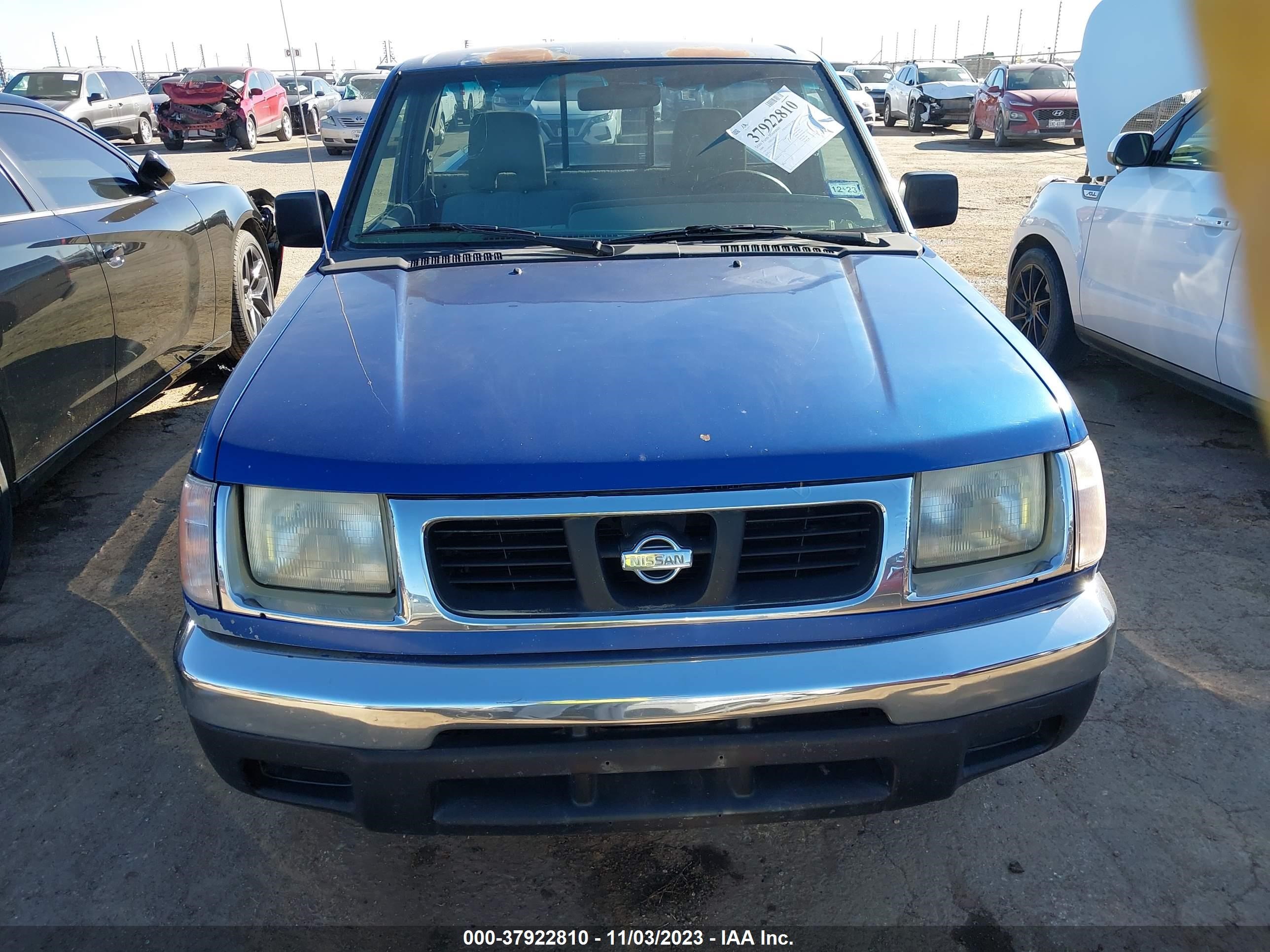 Photo 10 VIN: 1N6DD21S5XC310362 - NISSAN NAVARA (FRONTIER) 