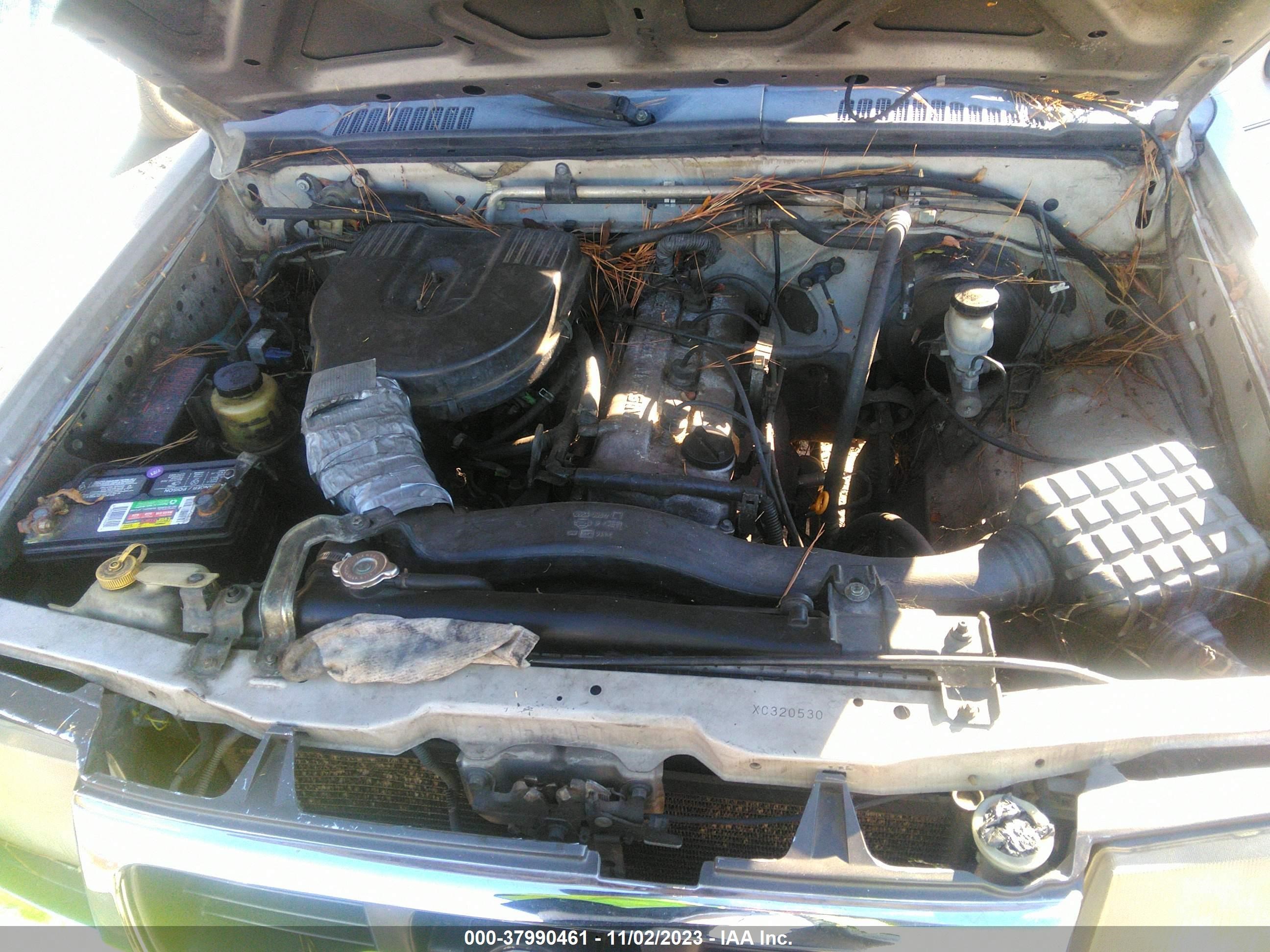 Photo 9 VIN: 1N6DD26S5XC320530 - NISSAN NAVARA (FRONTIER) 