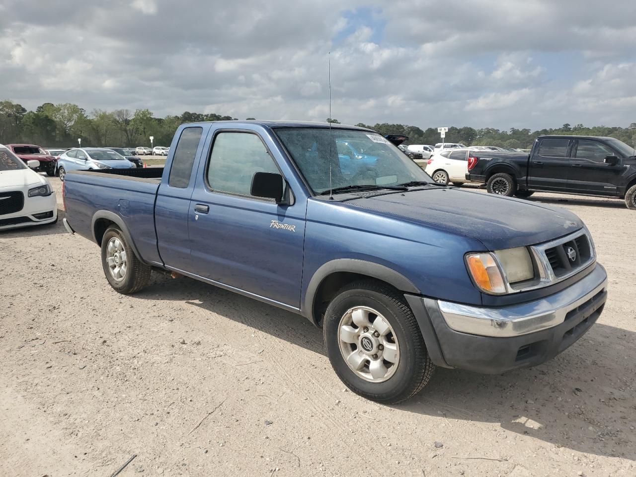 Photo 3 VIN: 1N6DD26S5YC328290 - NISSAN NAVARA (FRONTIER) 