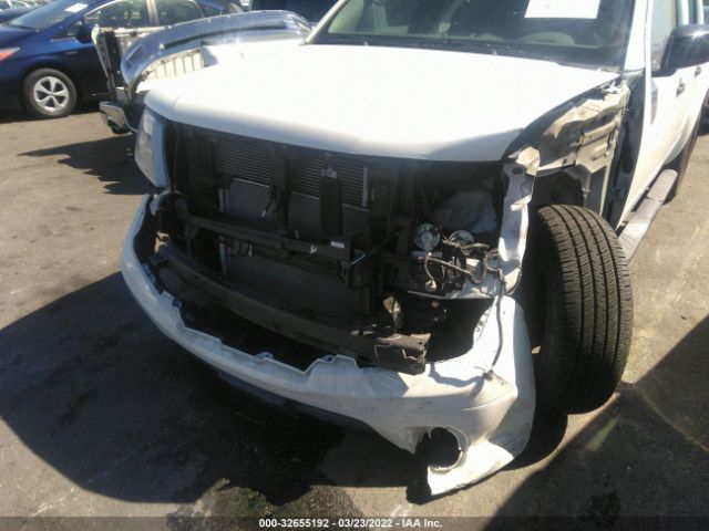 Photo 5 VIN: 1N6ED0EA1LN716860 - NISSAN FRONTIER 