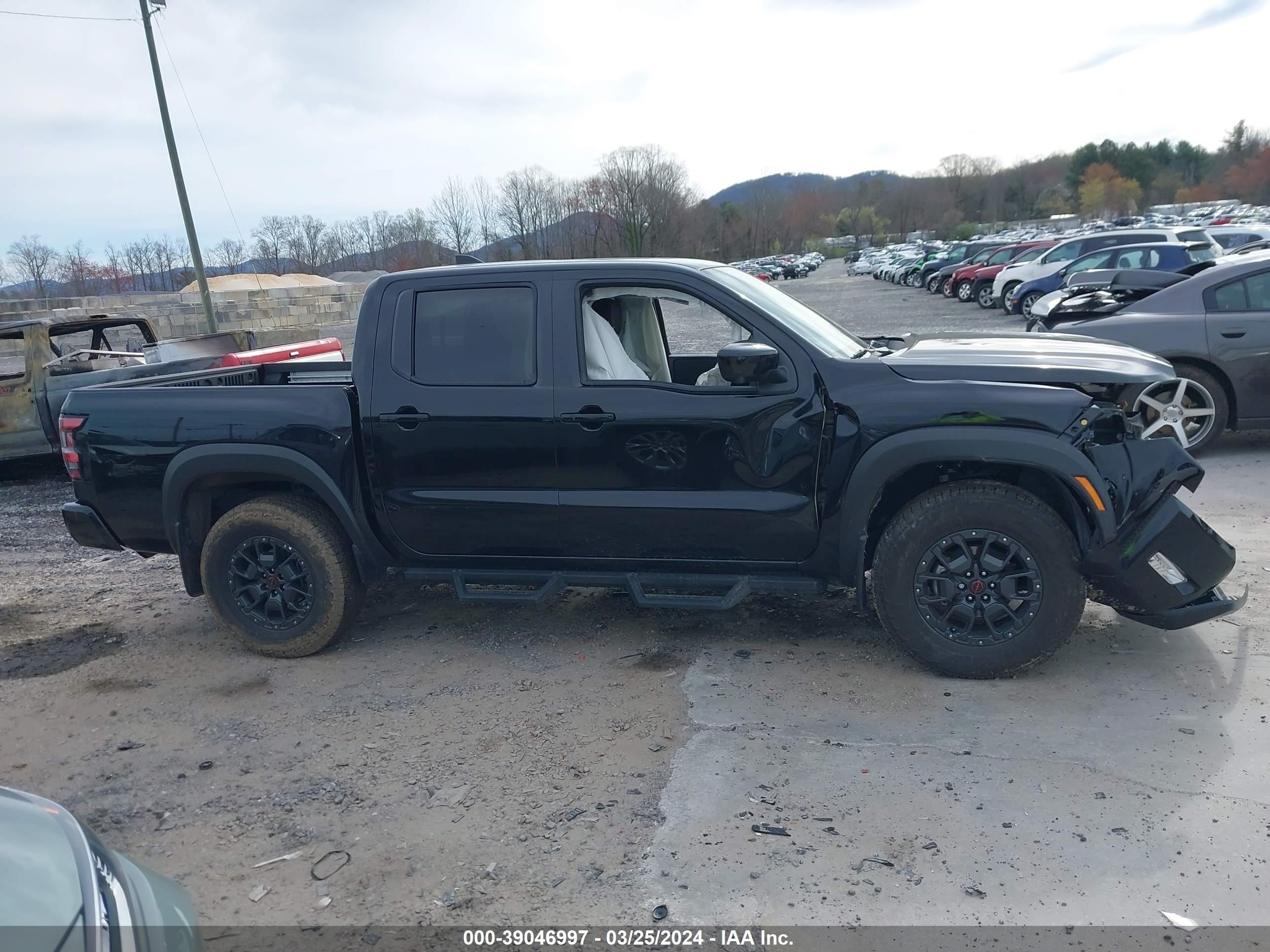 Photo 11 VIN: 1N6ED1EK0PN617175 - NISSAN FRONTIER 