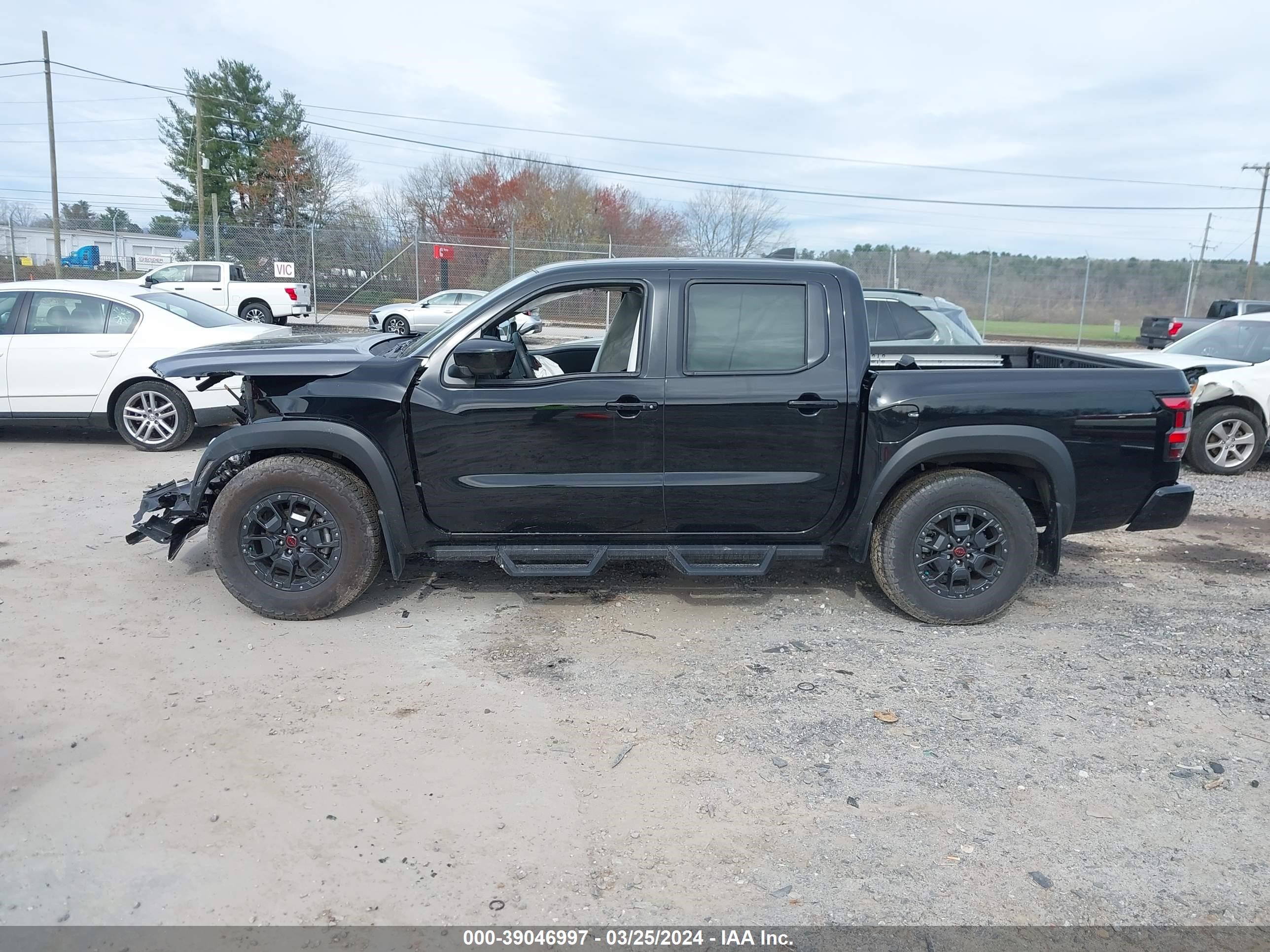 Photo 12 VIN: 1N6ED1EK0PN617175 - NISSAN FRONTIER 