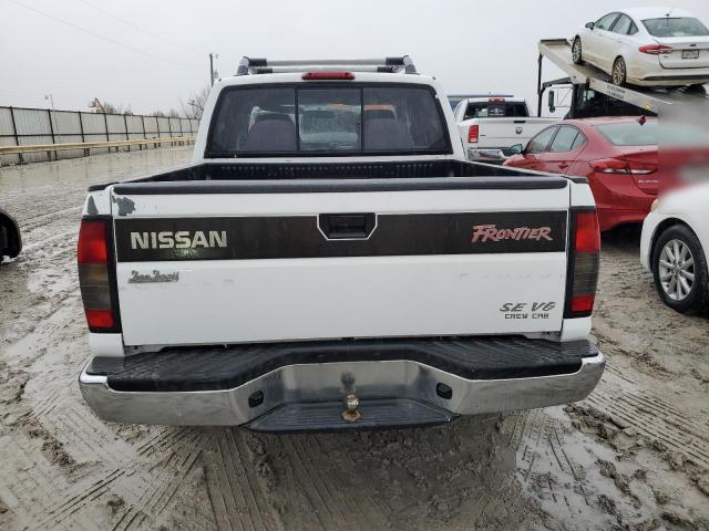 Photo 5 VIN: 1N6ED27T4YC423676 - NISSAN FRONTIER 