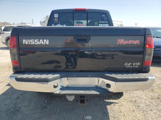 Photo 5 VIN: 1N6ED27Y5YC306345 - NISSAN FRONTIER 