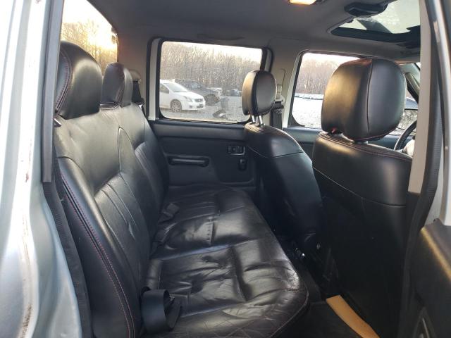 Photo 10 VIN: 1N6MD29YX2C371787 - NISSAN FRONTIER 