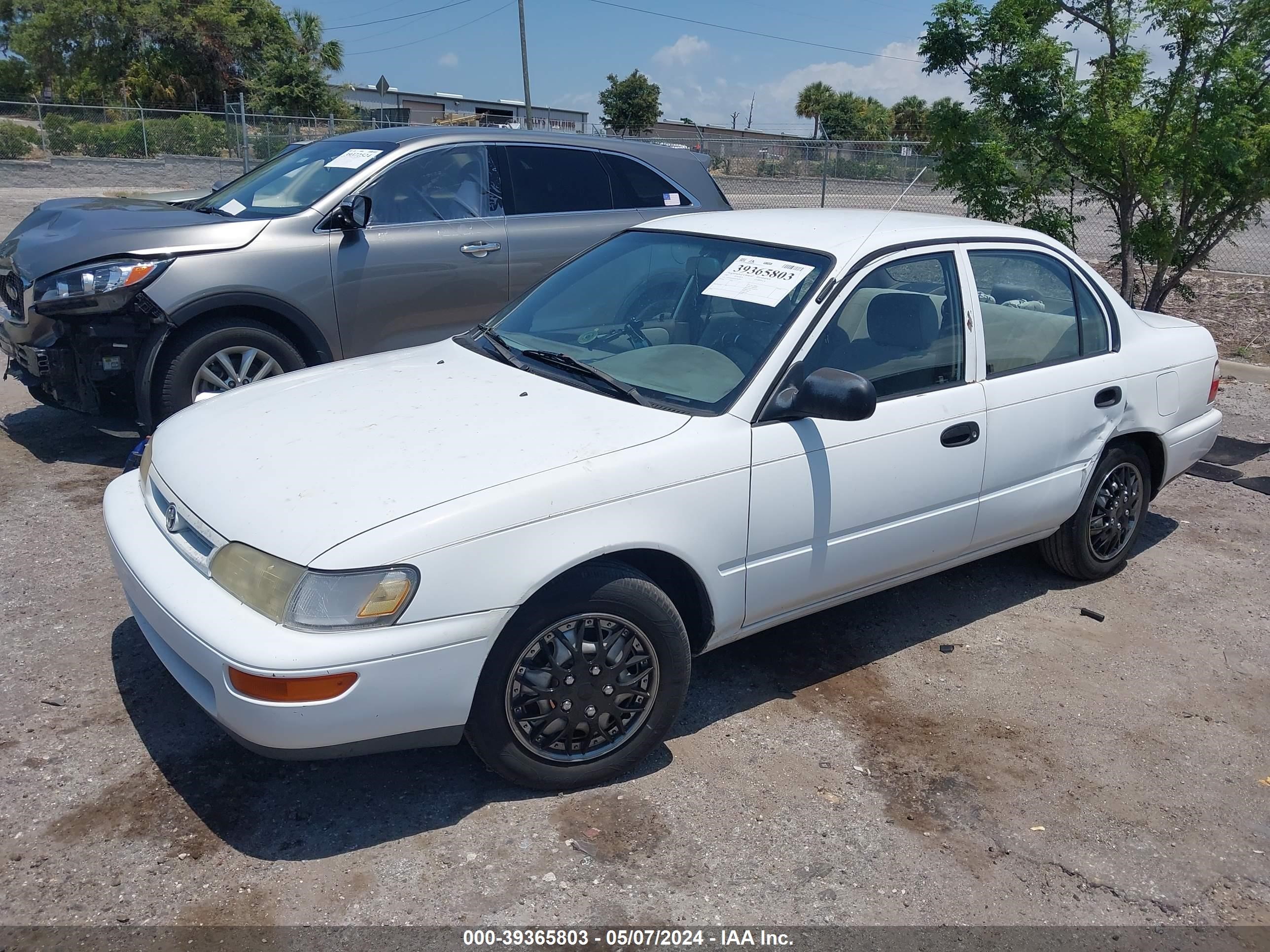 Photo 1 VIN: 1NXBA02E4VZ569587 - TOYOTA COROLLA 