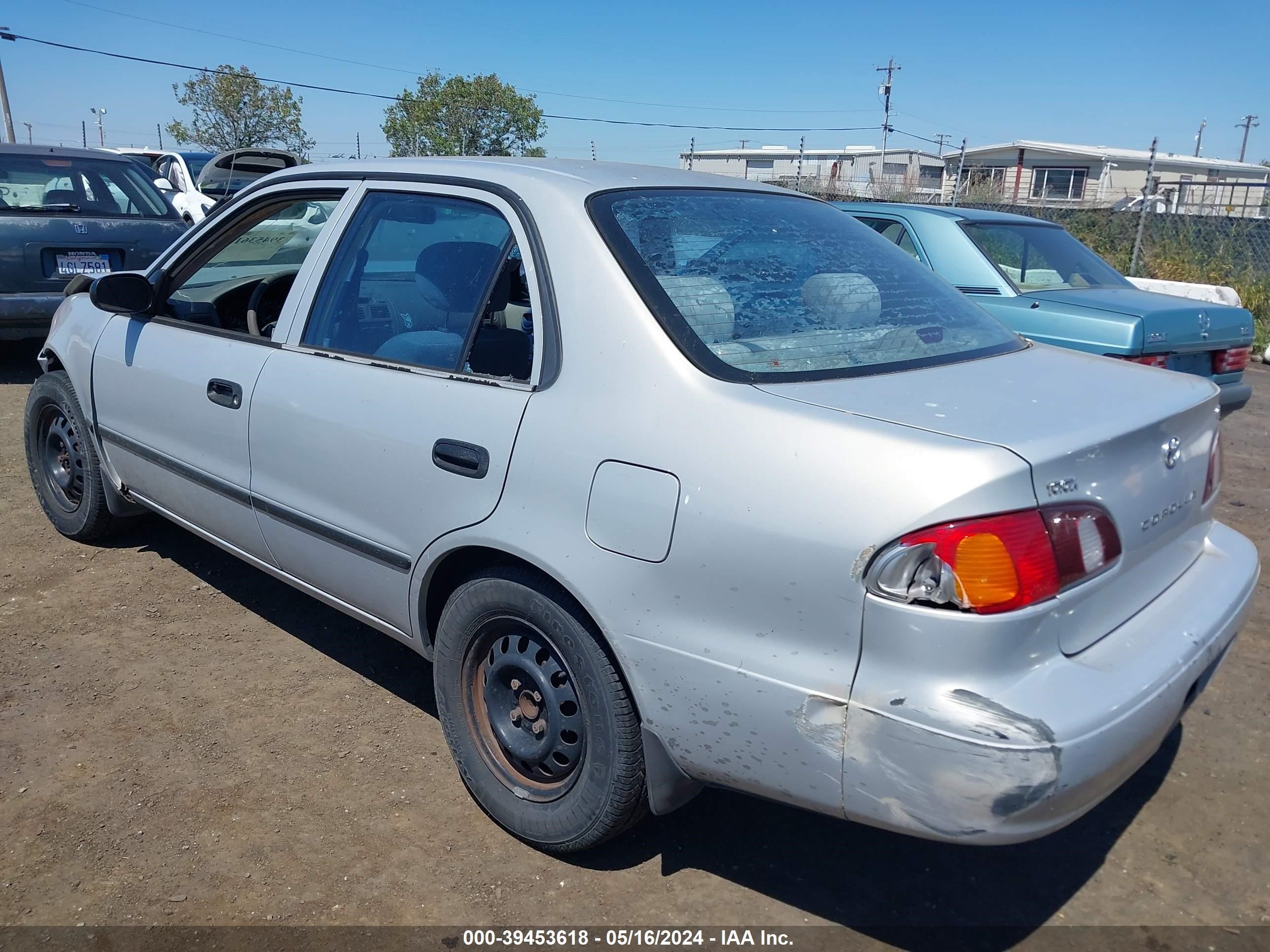 Photo 2 VIN: 1NXBR12E4YZ357713 - TOYOTA COROLLA 