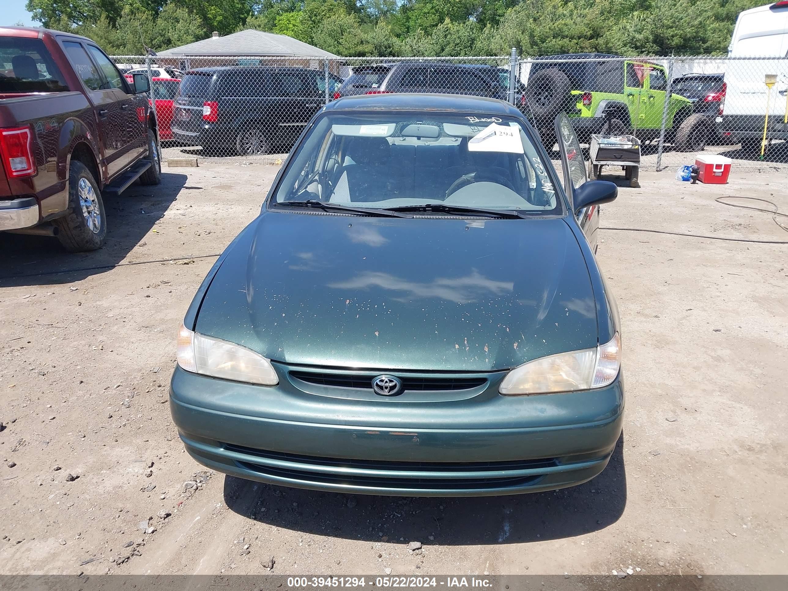 Photo 11 VIN: 1NXBR12E6YZ337799 - TOYOTA COROLLA 