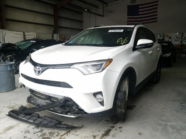 Photo 1 VIN: 1TMWFREV6GJ060533 - TOYOTA RAV4 XLE 